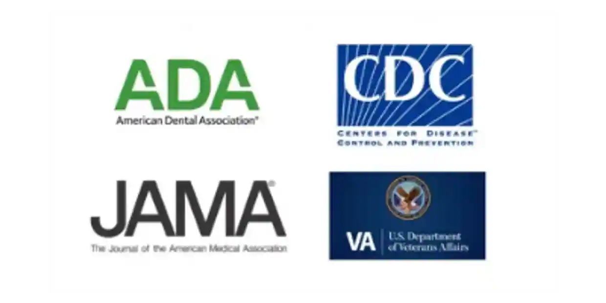 A group of logos for the american dental association, cdc, and va.