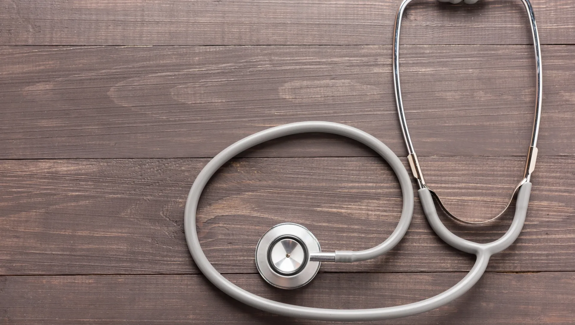 A stethoscope is laying on the table.